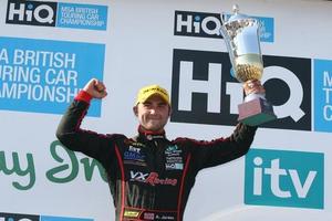 Andrew Jordan celebrates a podium finish in the HiQ MSA BTCC