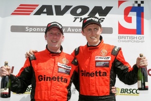 Piers Johnson on the British GT podium with co-driver Oliver Bryant