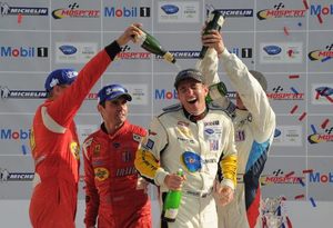 Oliver being showered with Champagne at Bowmanville, July 2011 at GT2 winner